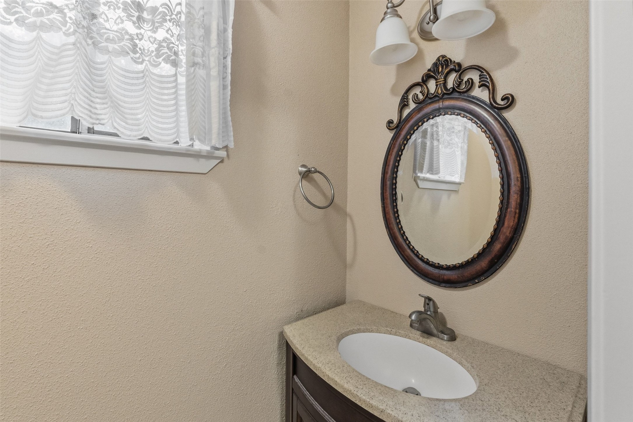 702 Castle Ridge Road, Unit C Austin, TX 78746 - Photo 6 of 36 Half bath on first floor.