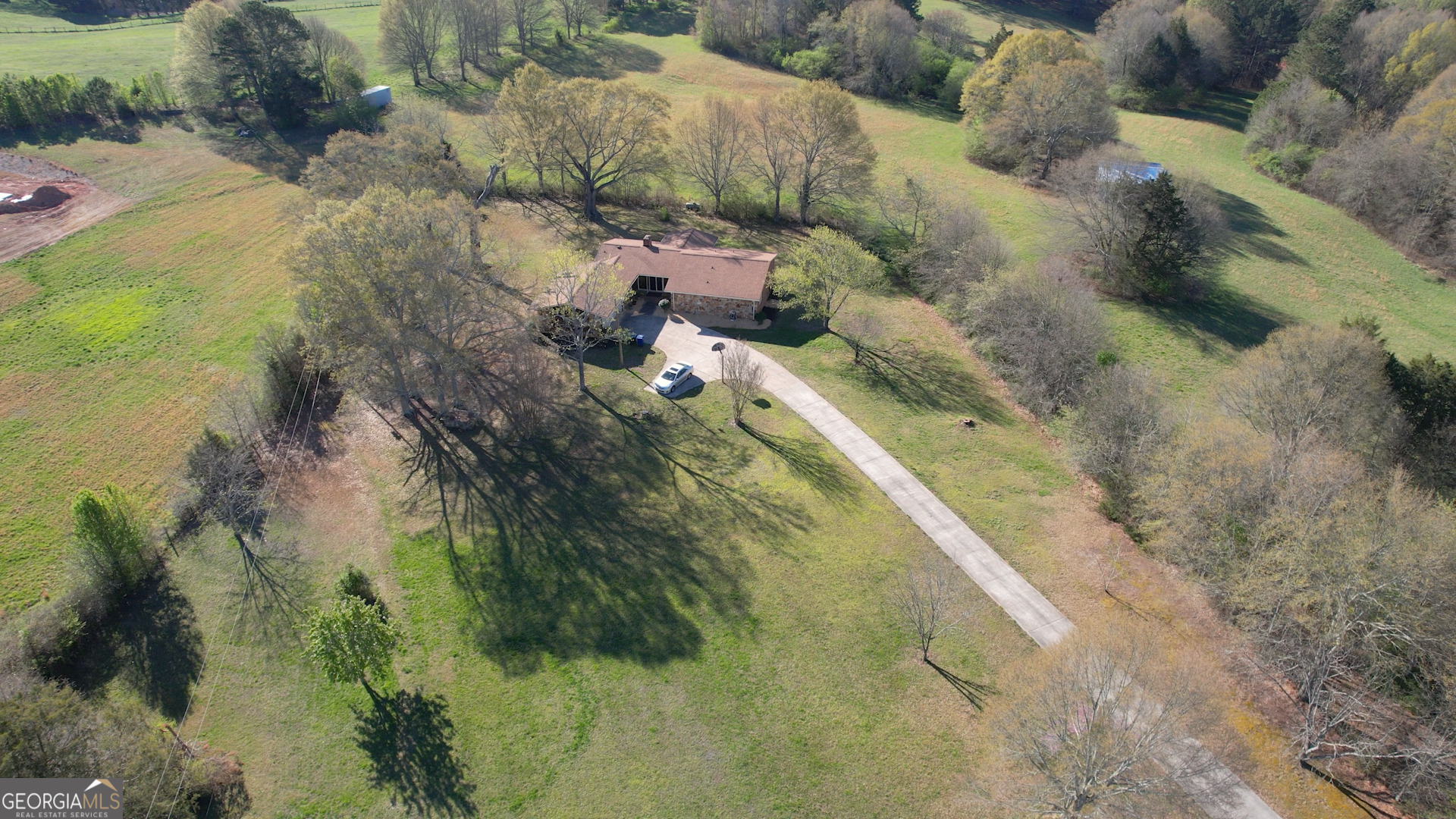 610 Loth Wages Road Dacula, GA 30019 - Photo 41 of 48 a view of a lake with houses