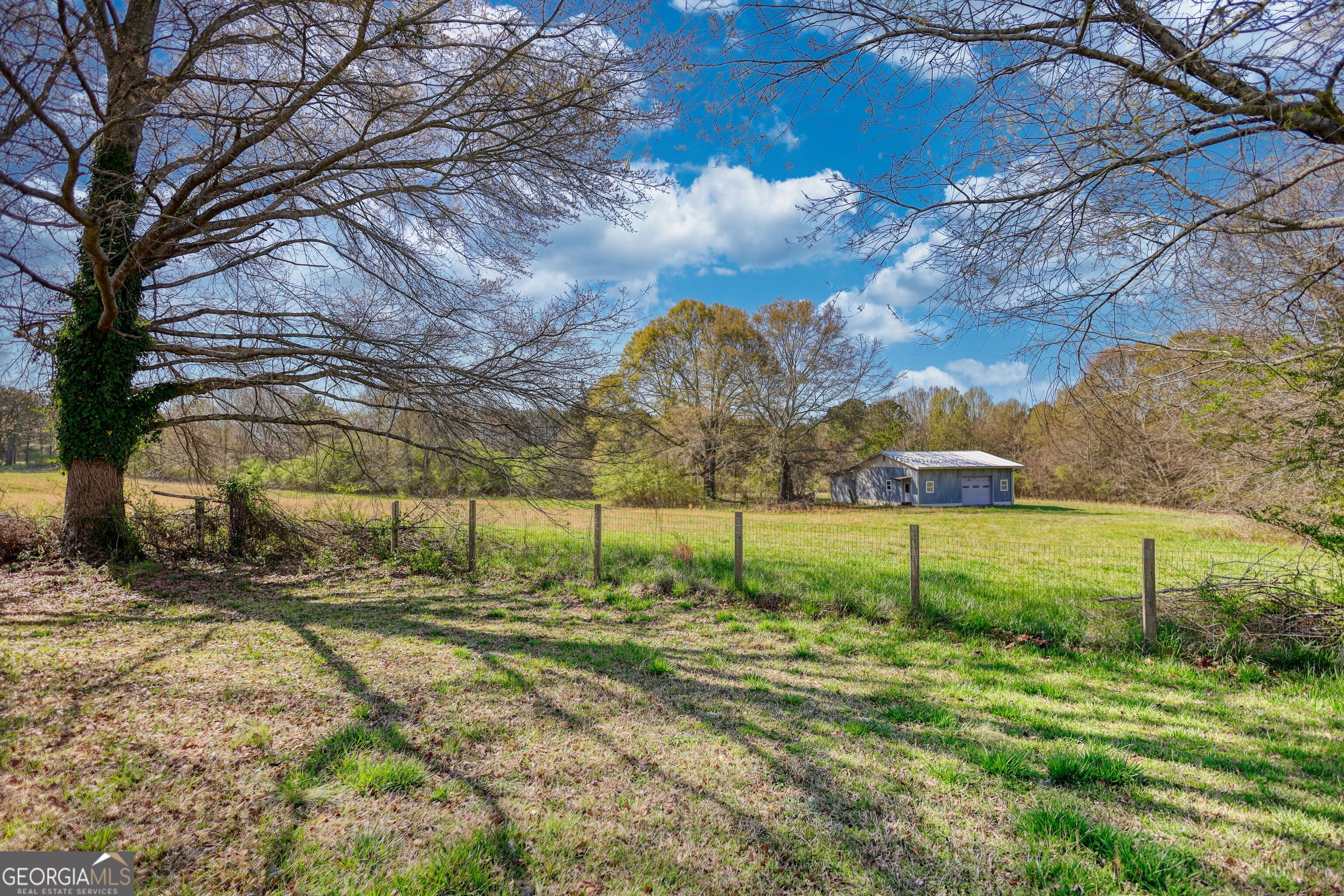 610 Loth Wages Road Dacula, GA 30019 - Photo 7 of 48 a view of yard with tree