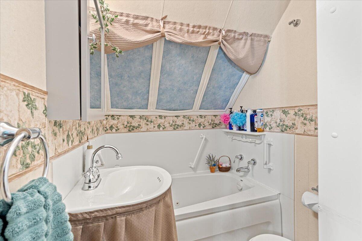 779 Catawba Road Daleville, VA 24083 - Photo 21 of 56 a bathroom with a sink and a mirror