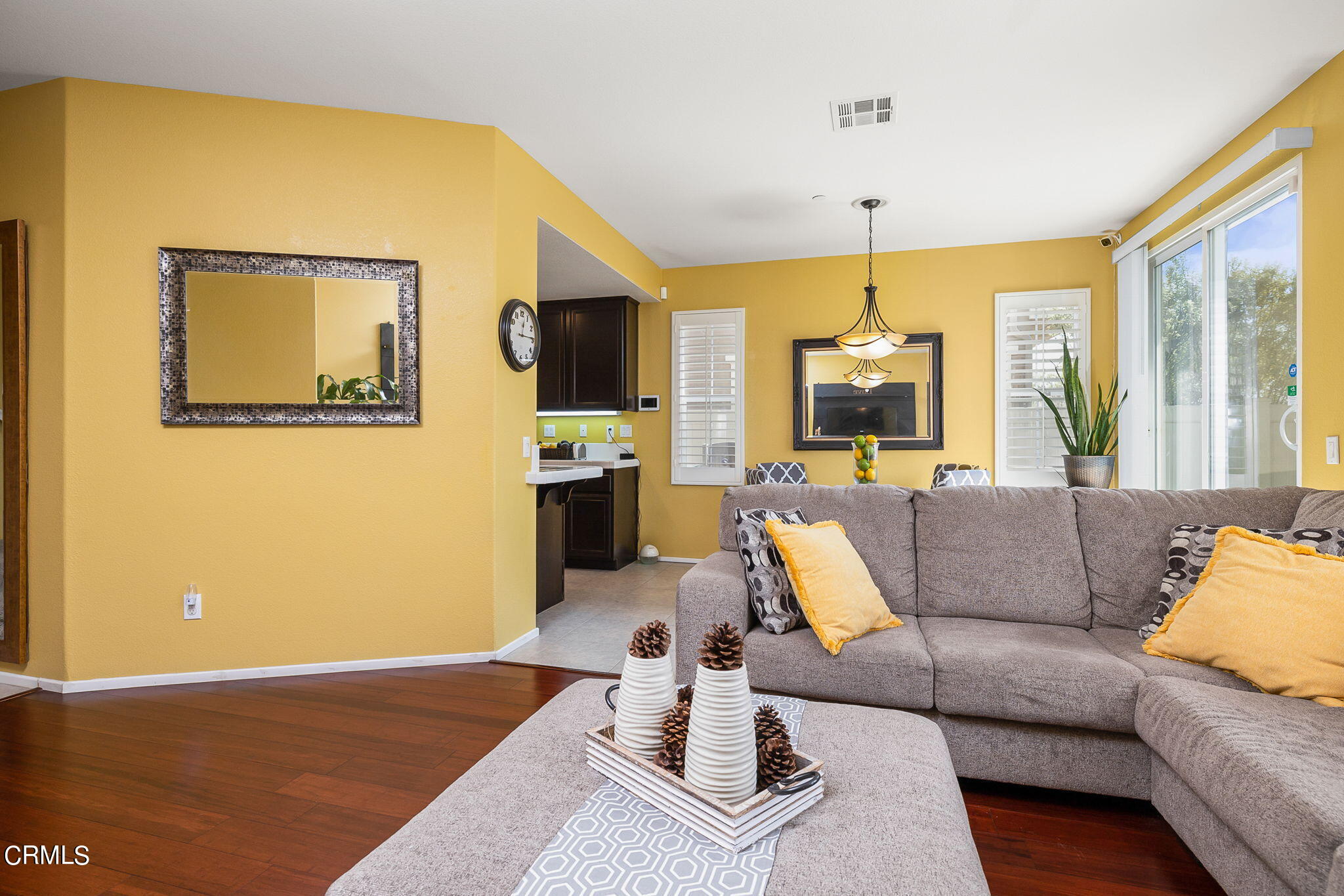 528 Field Street Oxnard, CA 93033 - Photo 2 of 24 a living room with furniture and a flat screen tv
