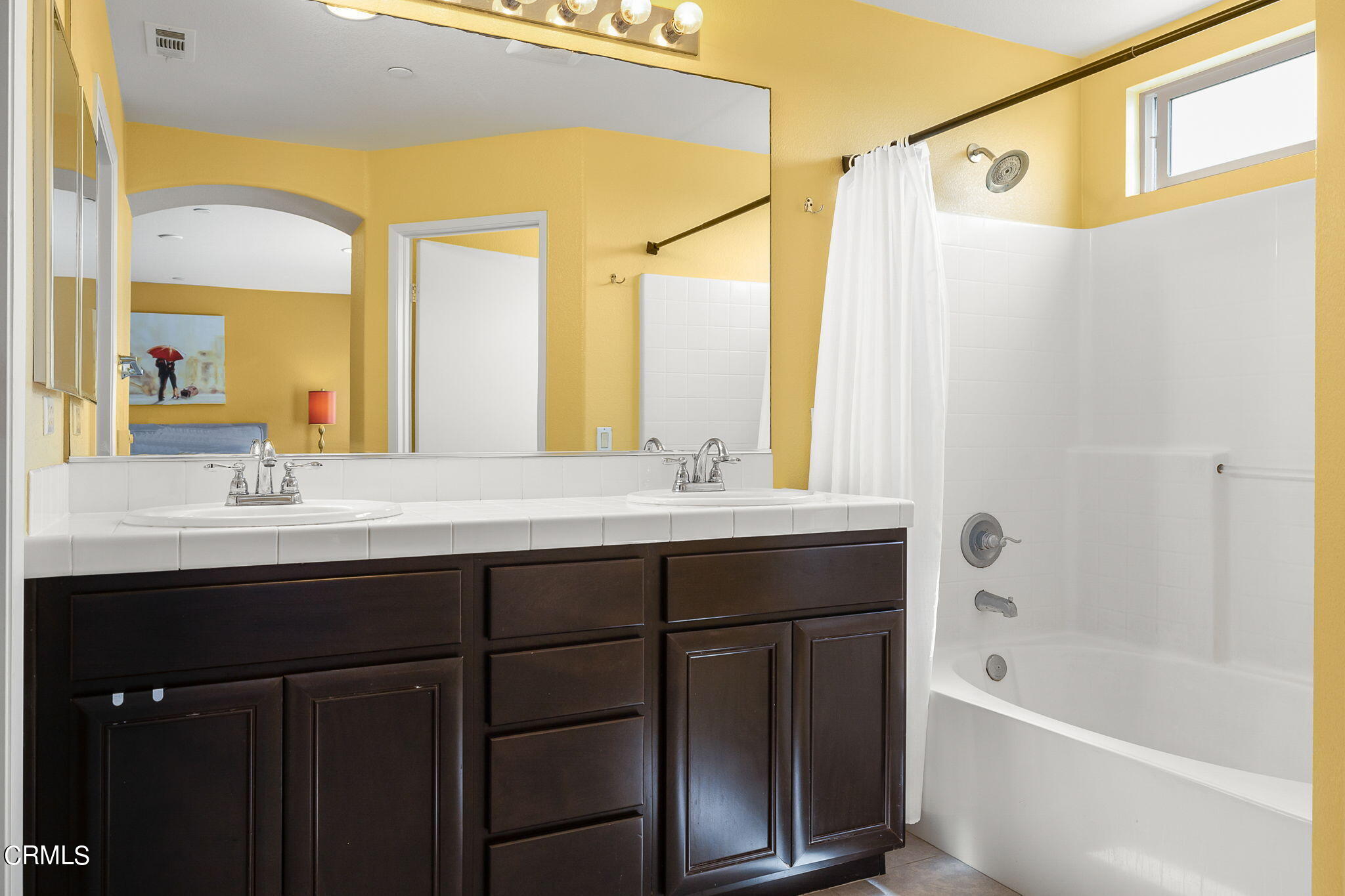 528 Field Street Oxnard, CA 93033 - Photo 9 of 24 a bathroom with a tub a sink and a mirror