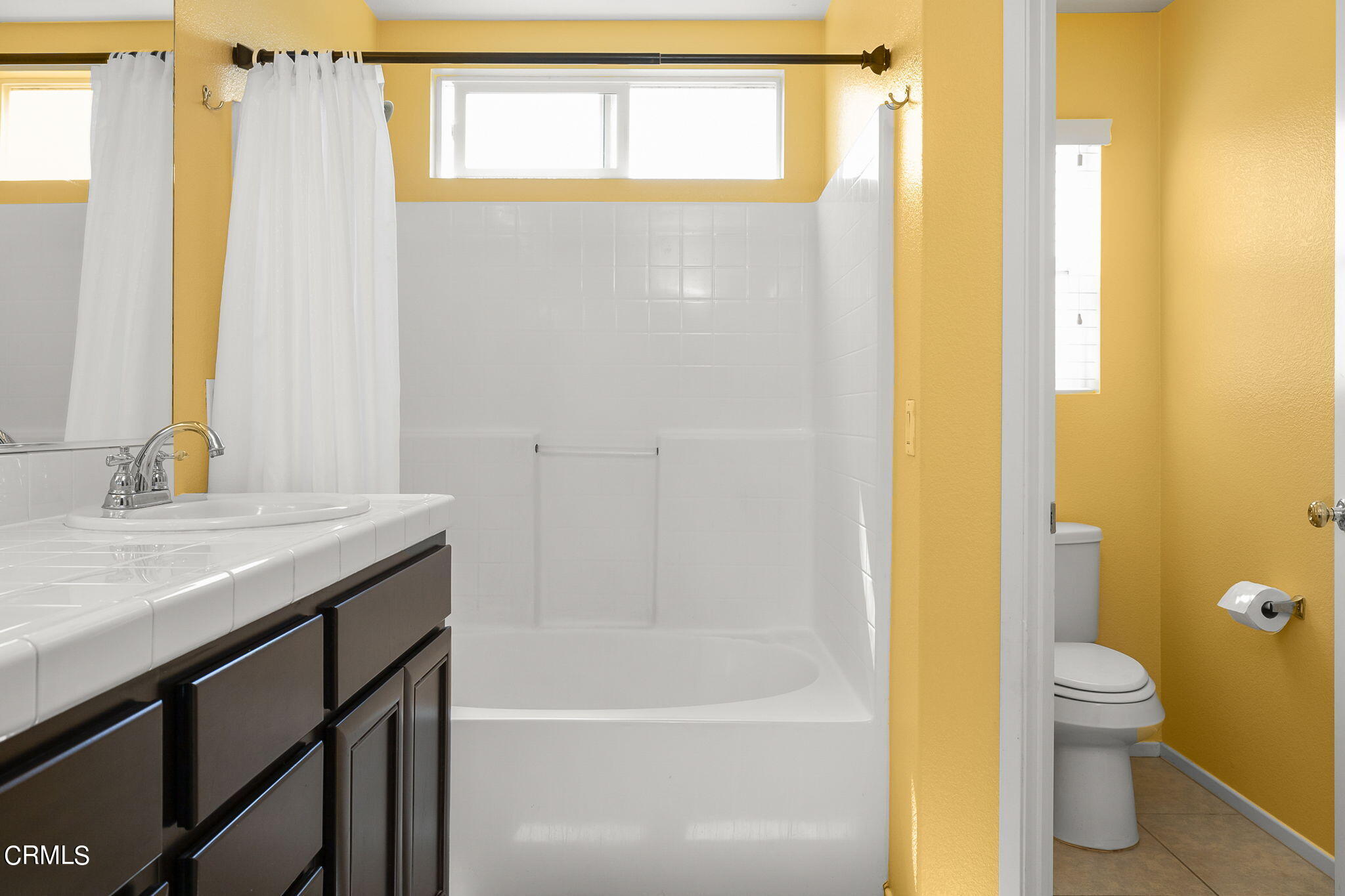 528 Field Street Oxnard, CA 93033 - Photo 10 of 24 a bathroom with a granite countertop sink toilet and shower