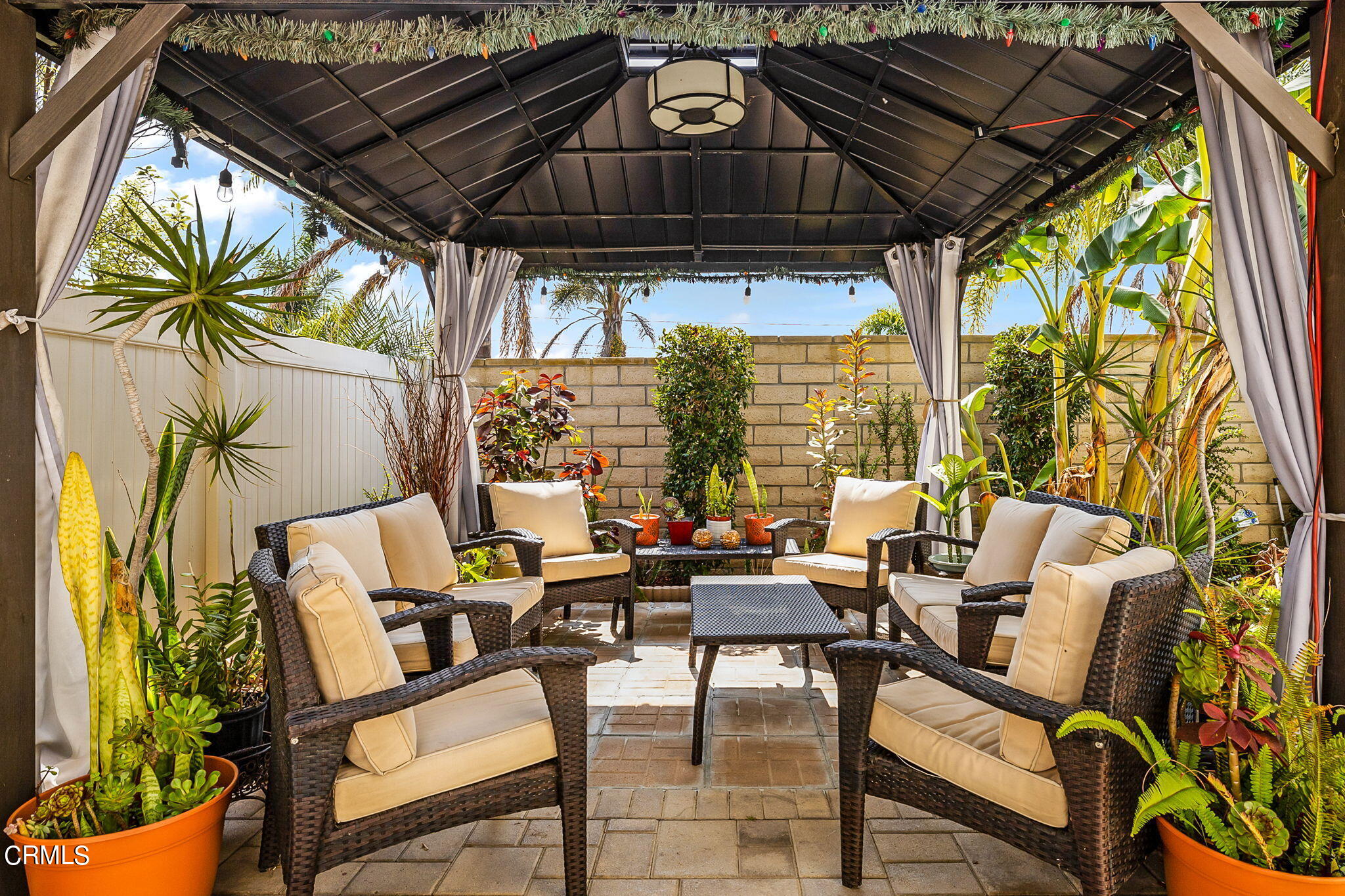 528 Field Street Oxnard, CA 93033 - Photo 16 of 24 a view of chairs and table in the patio