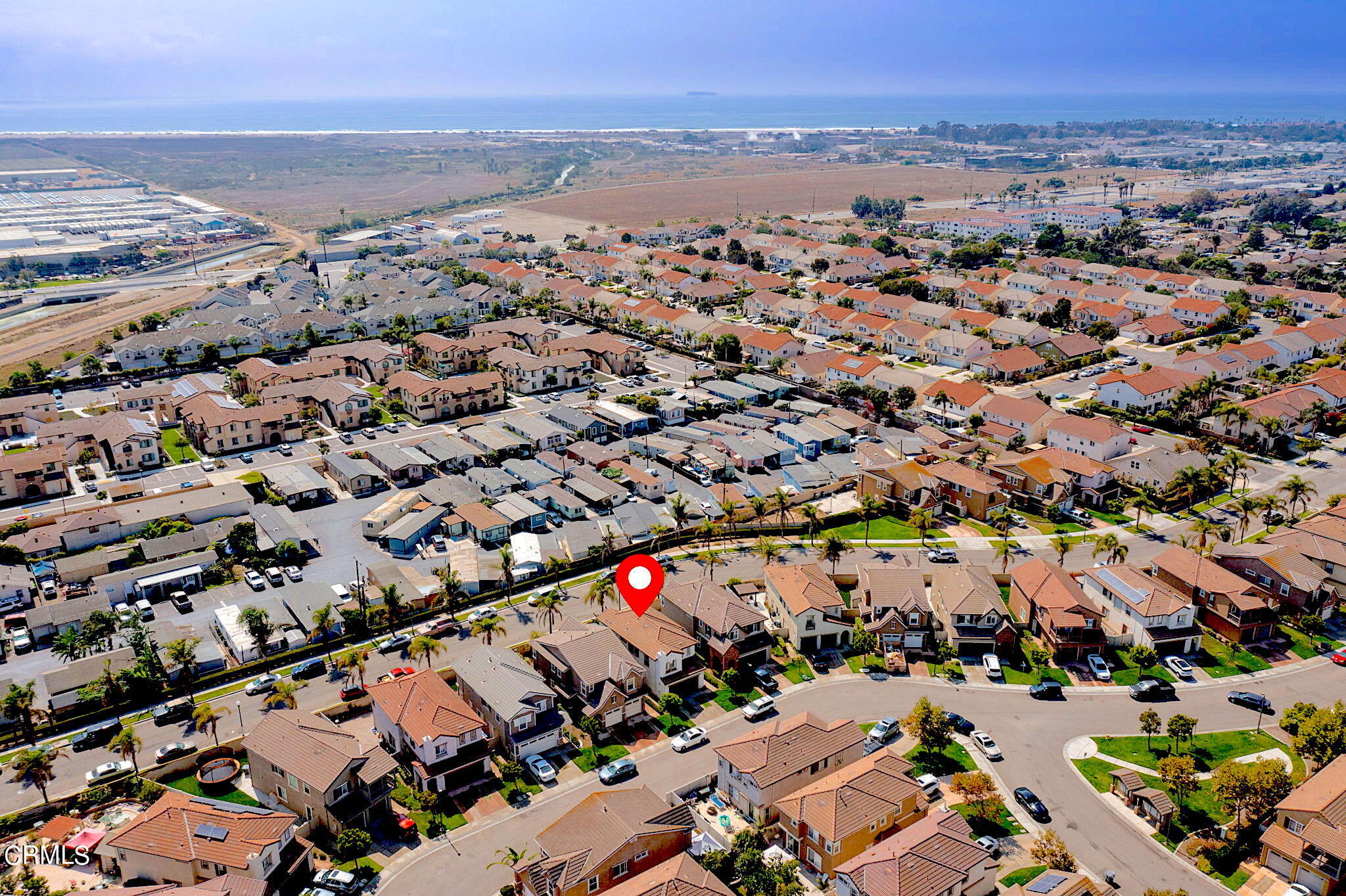 528 Field Street Oxnard, CA 93033 - Photo 19 of 24 an aerial view of a city with lots of residential buildings