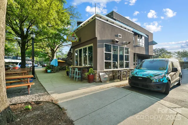 a front view of a house with a outdoor space