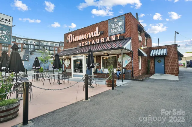 a view of a chairs and table in a patio