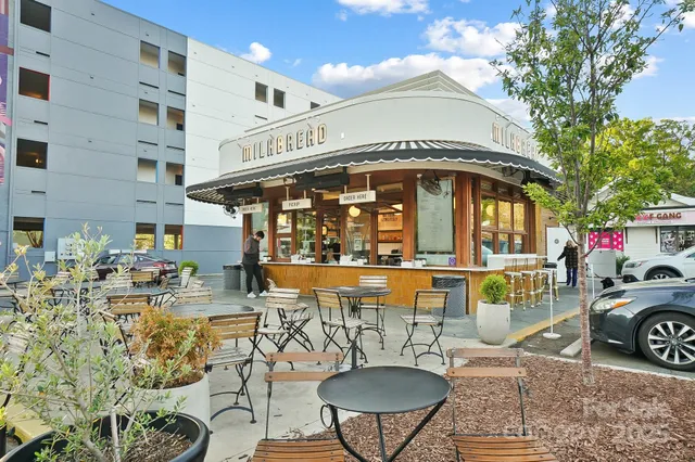 a front view of a building with seating space