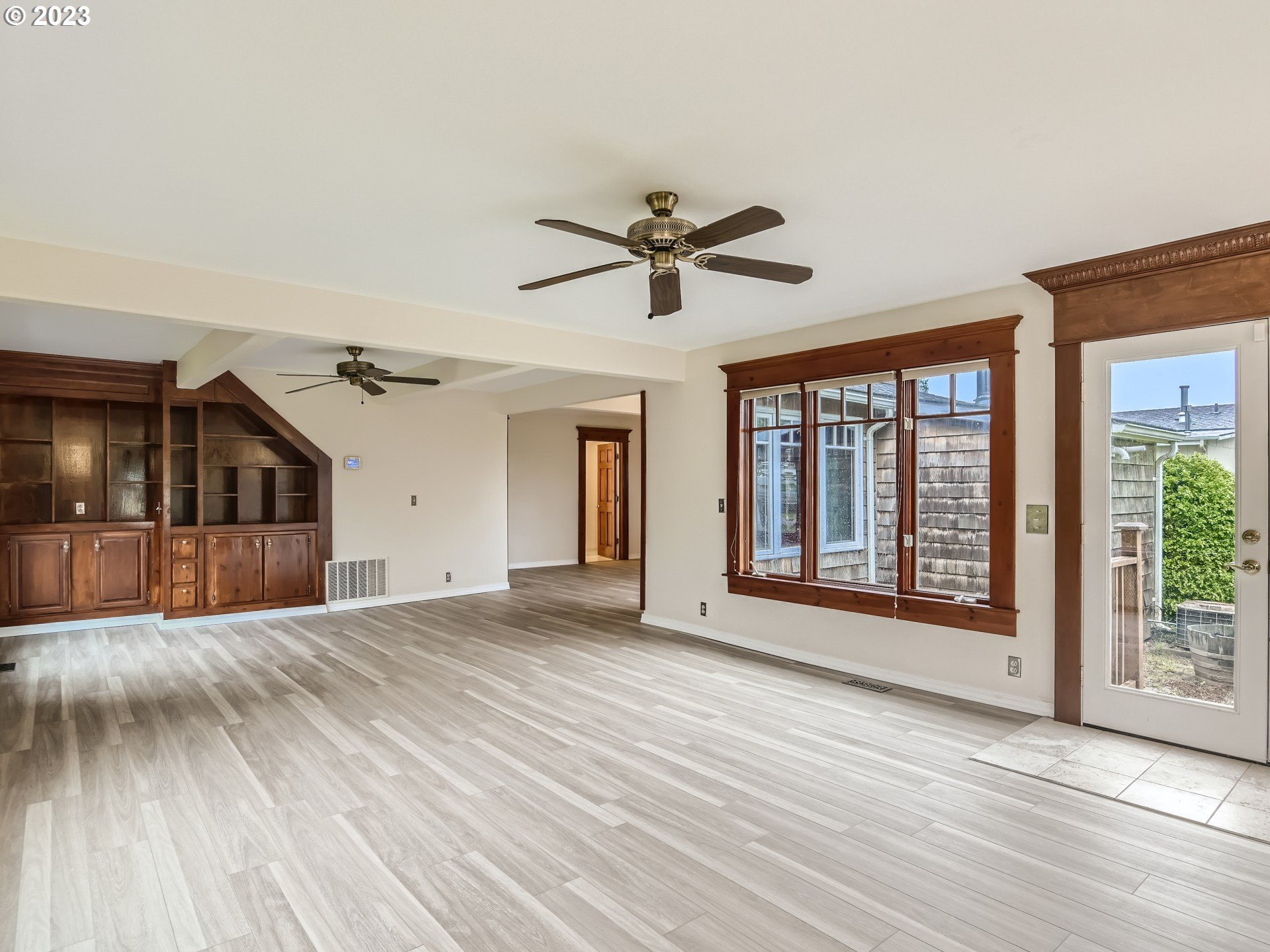 32062 South Barlow Road Canby, OR 97013 - Photo 15 of 33 a view of a livingroom with a ceiling fan and window
