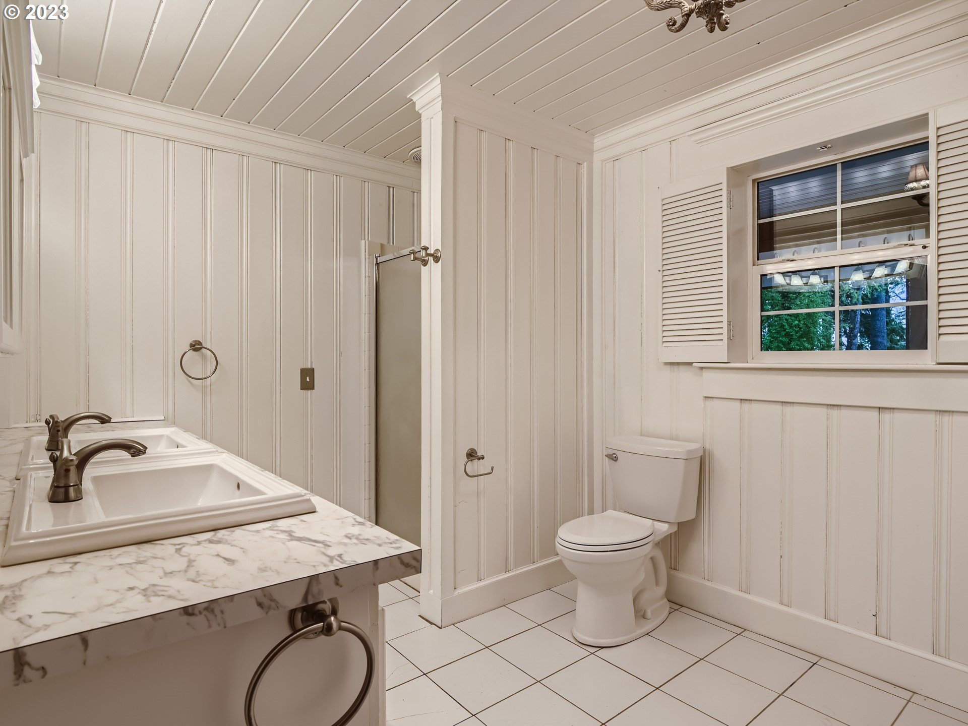 32062 South Barlow Road Canby, OR 97013 - Photo 16 of 33 a bathroom with a granite countertop sink toilet and shower