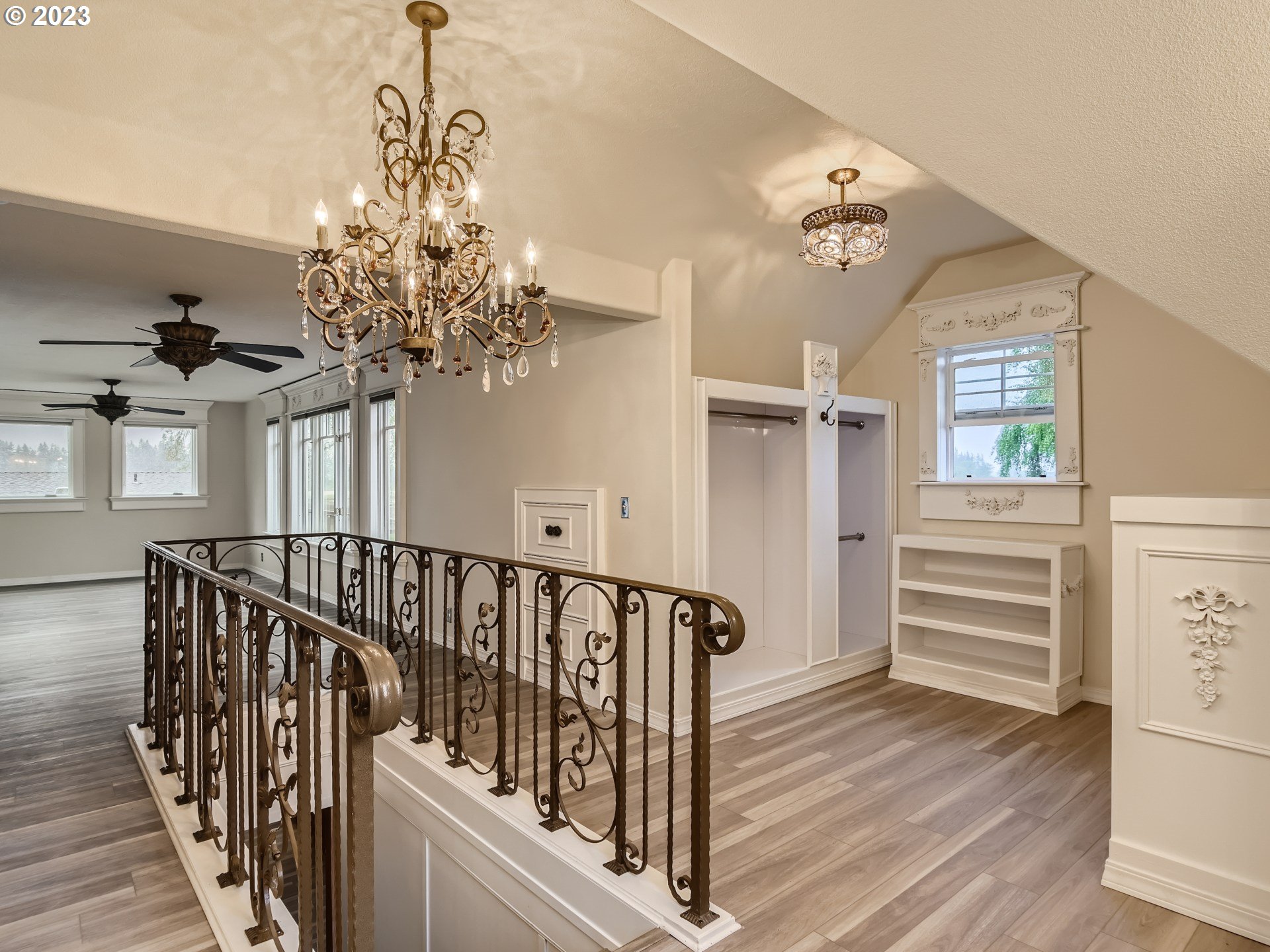 32062 South Barlow Road Canby, OR 97013 - Photo 20 of 33 a view of a hallway with wooden floor and staircase