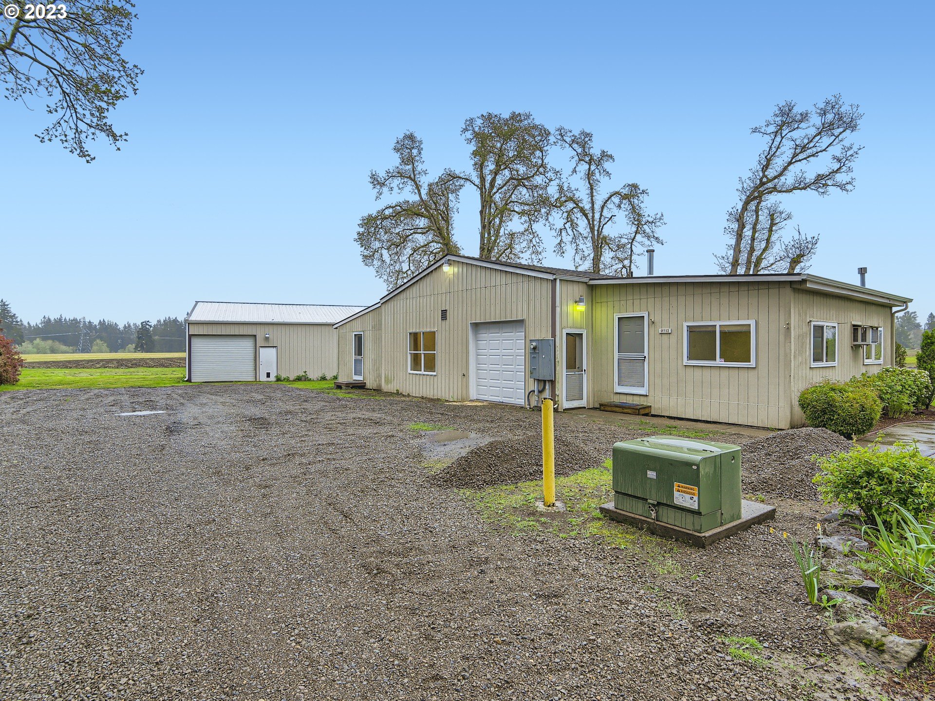 32062 South Barlow Road Canby, OR 97013 - Photo 28 of 33 a view of a house with garden and a yard
