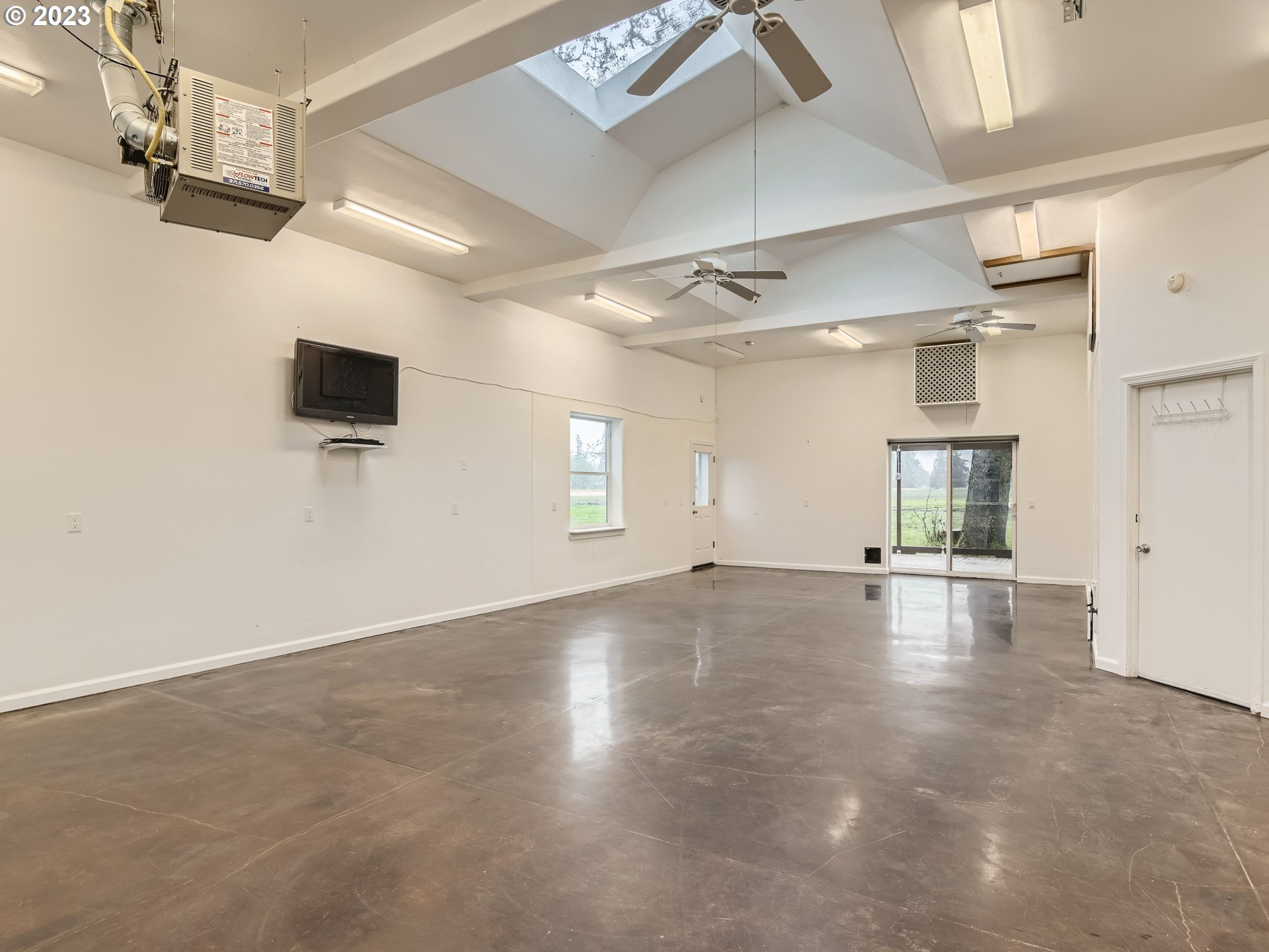 32062 South Barlow Road Canby, OR 97013 - Photo 29 of 33 an empty room with windows and fireplace
