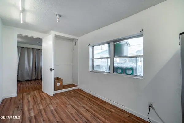 a view of livingroom with hardwood floor and window