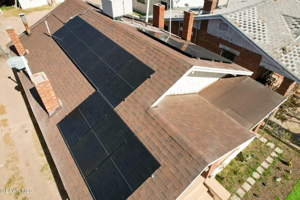 a balcony with view of car parked