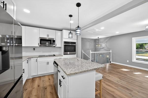 1864 Glen Echo Drive Decatur, GA 30032 - Photo 13 of 38 a kitchen with stainless steel appliances granite countertop a sink stove and refrigerator