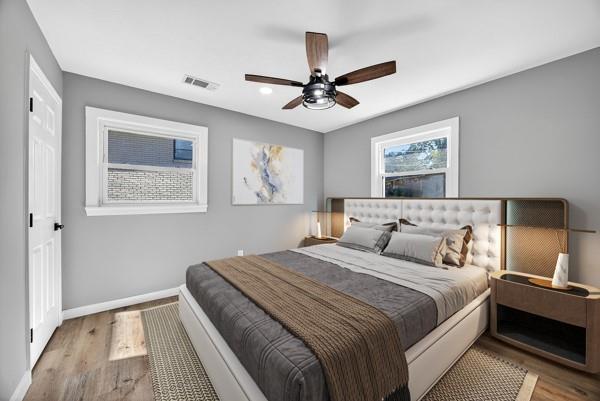 1864 Glen Echo Drive Decatur, GA 30032 - Photo 20 of 38 a bedroom with bed and painting on the wall