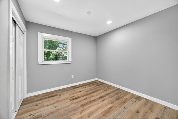 1864 Glen Echo Drive Decatur, GA 30032 - Photo 26 of 38 a view of empty room with wooden floor