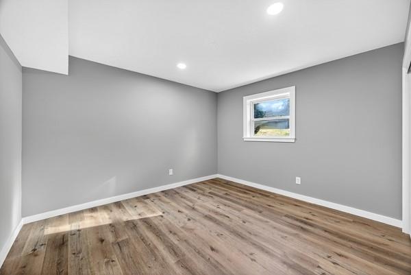 1864 Glen Echo Drive Decatur, GA 30032 - Photo 31 of 38 a view of room with wooden floor and window
