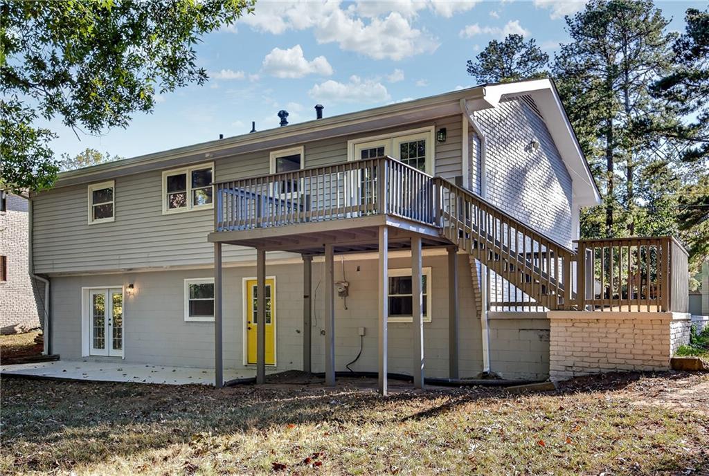 1864 Glen Echo Drive Decatur, GA 30032 - Photo 32 of 38 a front view of a house with a yard