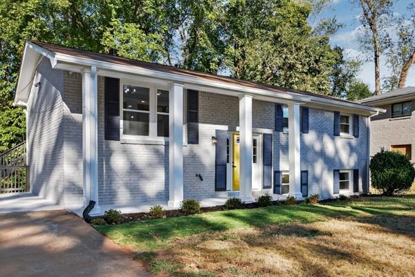 1864 Glen Echo Drive Decatur, GA 30032 - Photo 36 of 38 a view of a house with a yard and plants