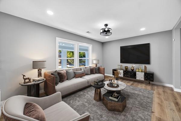 1864 Glen Echo Drive Decatur, GA 30032 - Photo 4 of 38 a living room with furniture and a flat screen tv