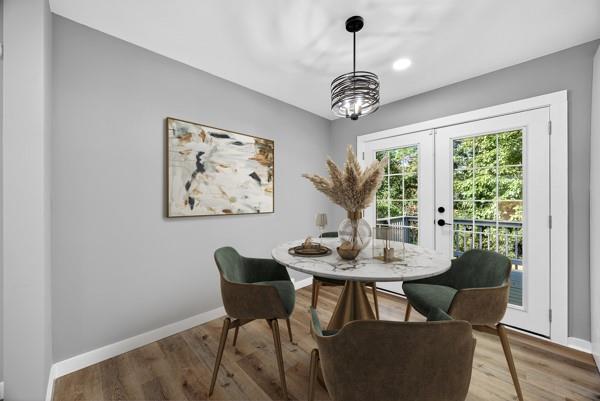1864 Glen Echo Drive Decatur, GA 30032 - Photo 6 of 38 a view of a dining room with furniture window and wooden floor