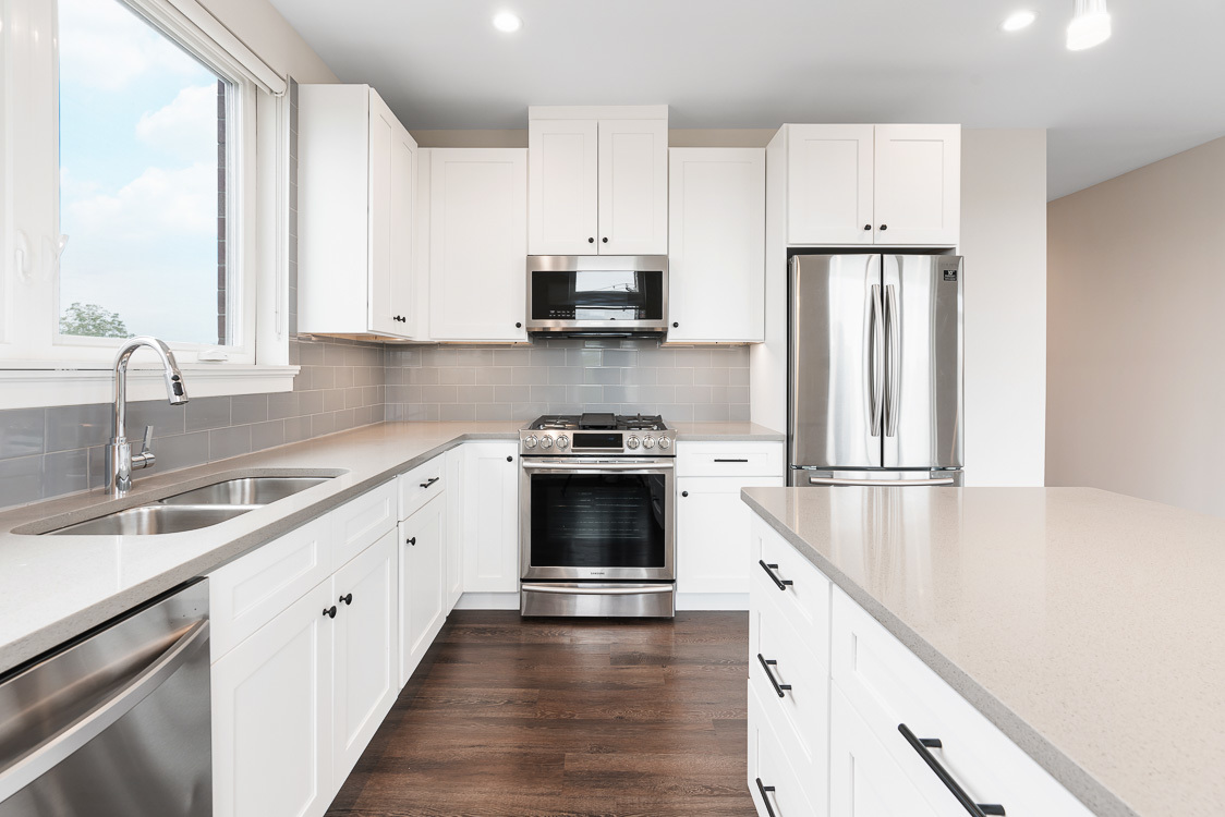 Undisclosed Address Highwood, IL 60040 - Photo 2 of 10 a kitchen with granite countertop a refrigerator stove top oven and sink