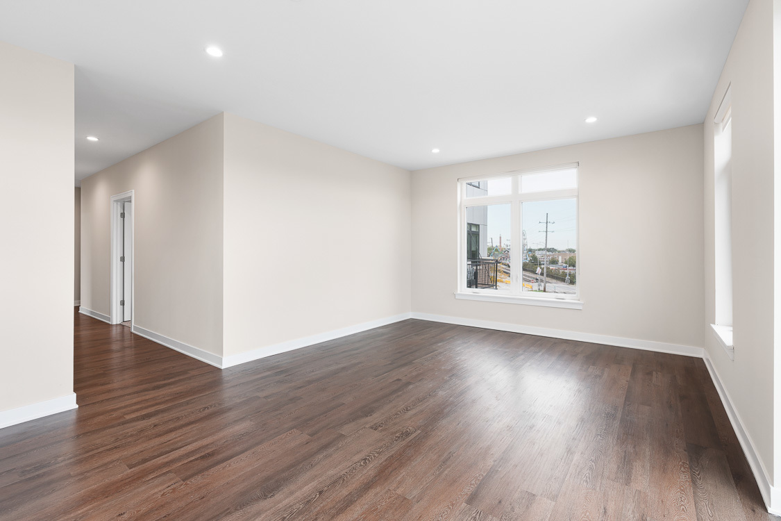 Undisclosed Address Highwood, IL 60040 - Photo 4 of 10 a view of an empty room with wooden floor and a window