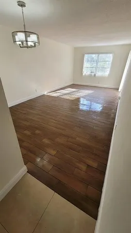 a view of a room with an empty space