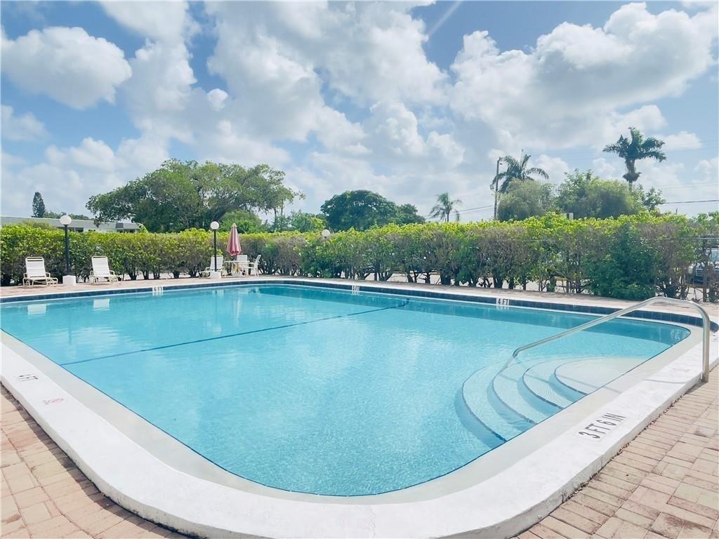 6505 Winfield Boulevard, Unit B6 Pompano Beach, FL 33063 - Photo 13 of 13 a view of a lake view