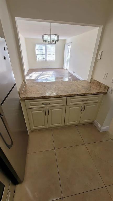 6505 Winfield Boulevard, Unit B6 Pompano Beach, FL 33063 - Photo 2 of 13 a view of fireplace and window