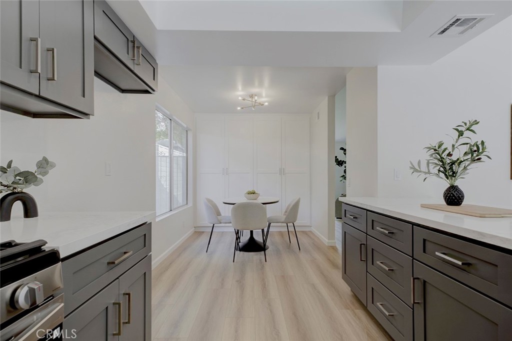3256 North Frederic Street Burbank, CA 91504 - Photo 15 of 45 a view of a kitchen with a sink and cabinets