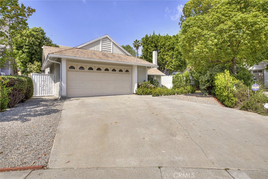 3256 North Frederic Street Burbank, CA 91504 - Photo 2 of 45 a front view of a house with a yard and garage