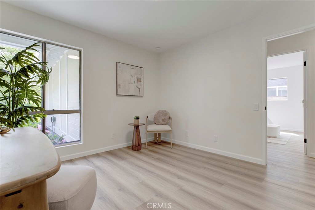 3256 North Frederic Street Burbank, CA 91504 - Photo 33 of 45 a bedroom with a bed and a chair
