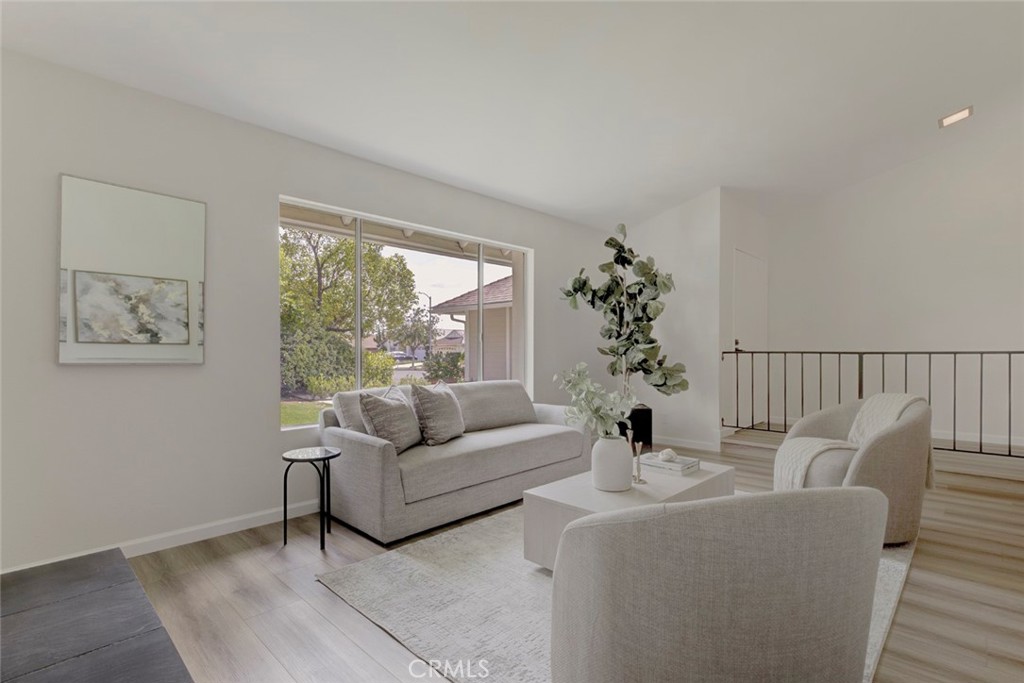 3256 North Frederic Street Burbank, CA 91504 - Photo 7 of 45 a living room with furniture and a large window