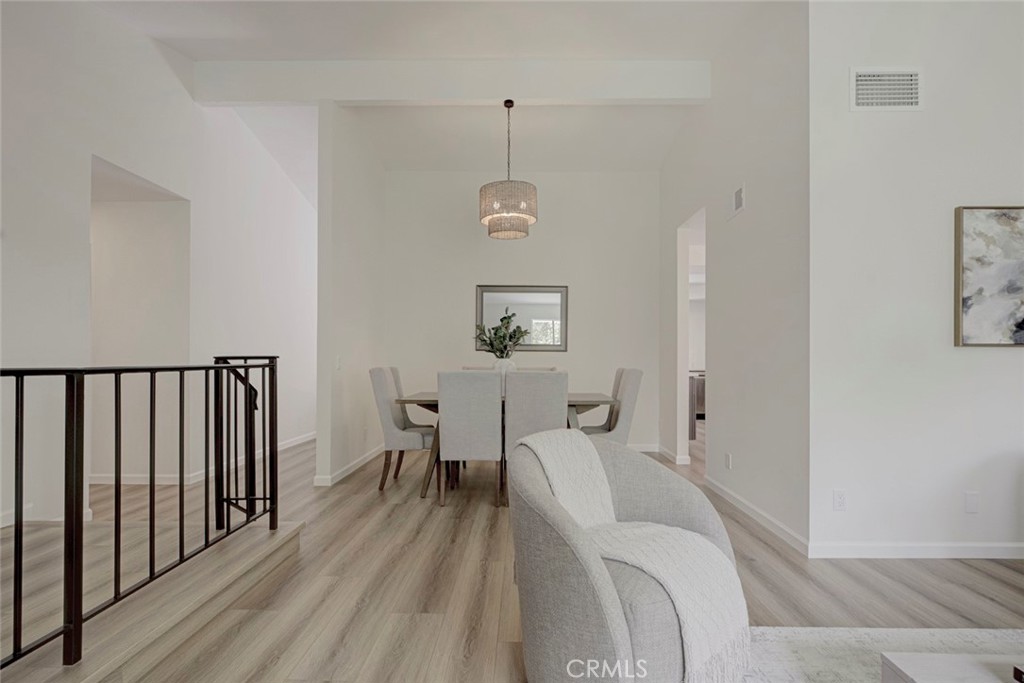 3256 North Frederic Street Burbank, CA 91504 - Photo 8 of 45 a bed room with a bed and a table