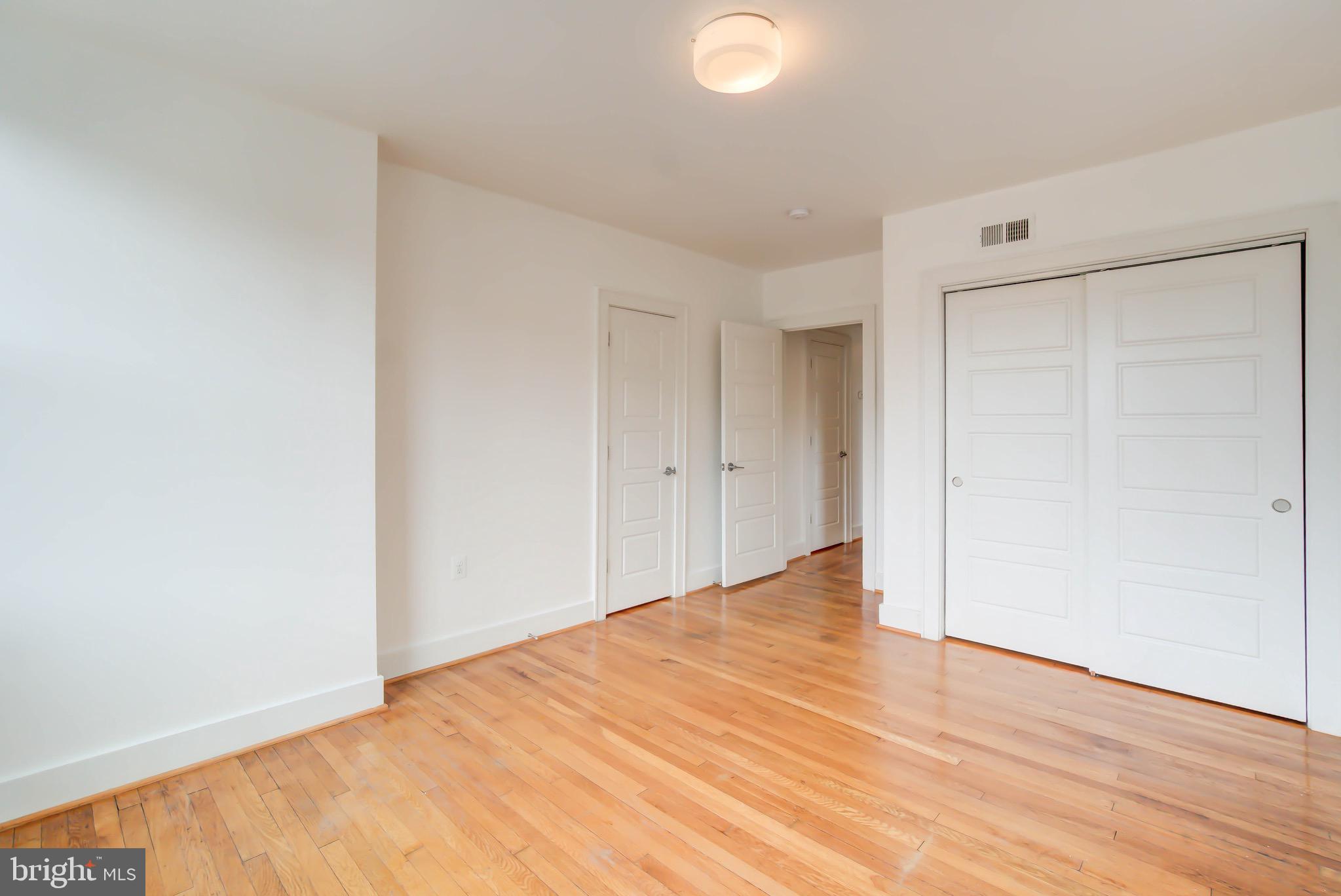 1575 Spring Place Northwest, Unit 35 Washington, DC 20010 - Photo 12 of 22 a view of an empty room