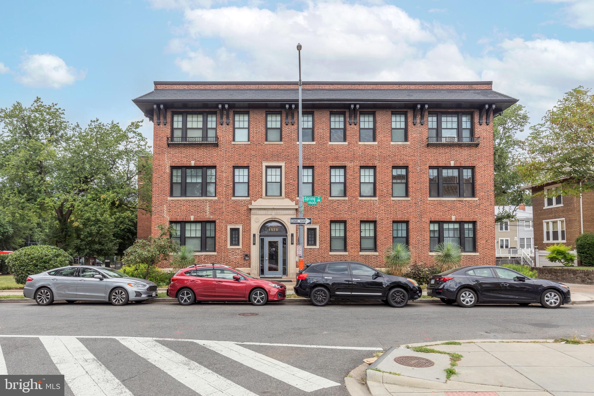 1575 Spring Place Northwest, Unit 35 Washington, DC 20010 - Photo 21 of 22 a car parked in front of a building