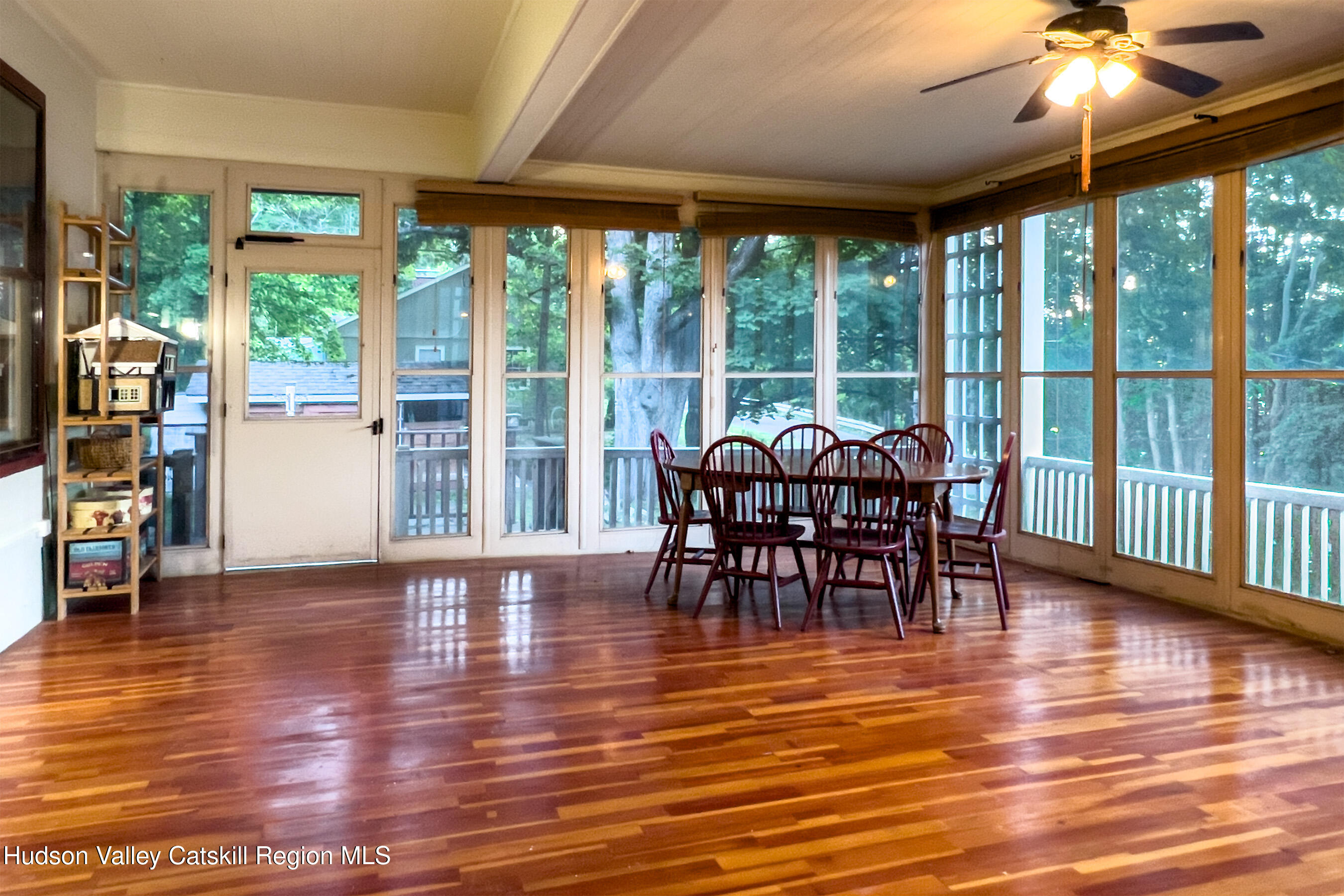 6 Westridge Road Cooperstown, NY 13326 - Photo 49 of 119 a view of a dining room with furniture window and wooden floor