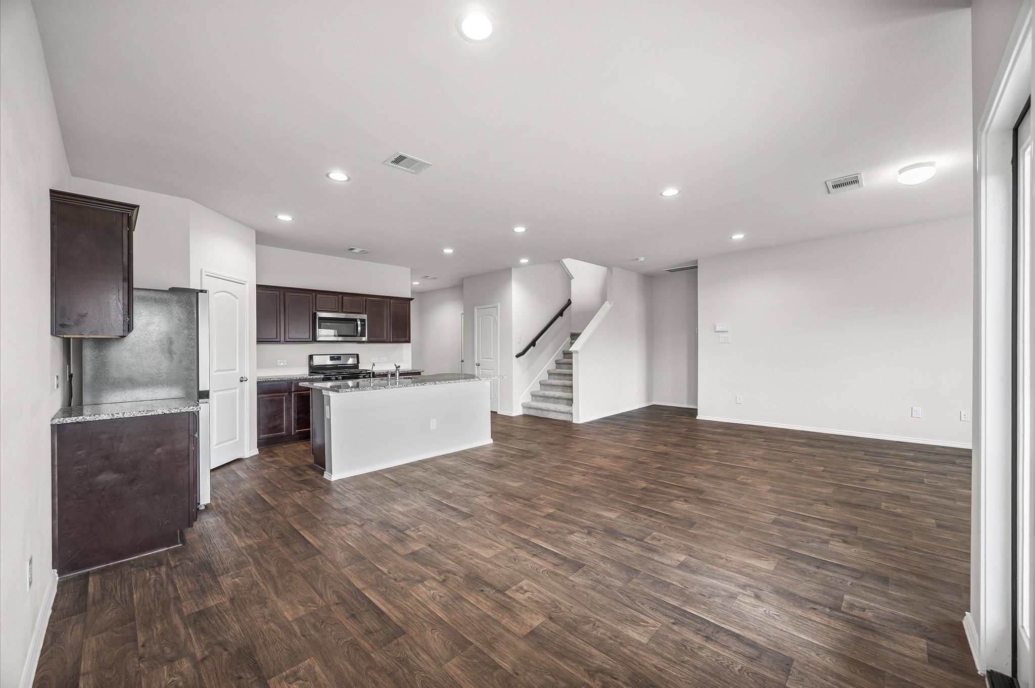 23522 Wedgewood Cliff Way Spring, TX 77373 - Photo 10 of 30 Another angle of the expansive open concept space.