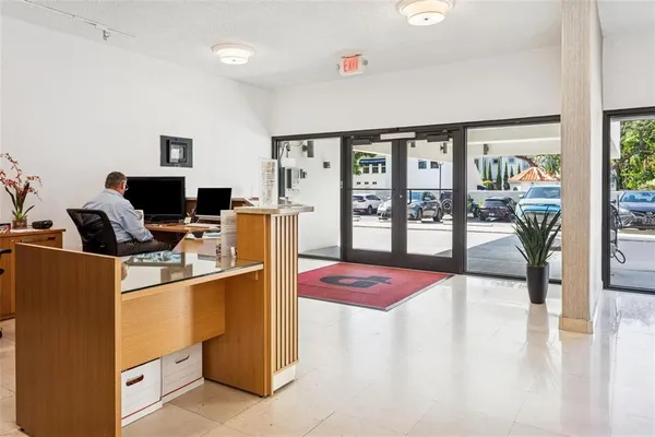 a workspace with furniture and window