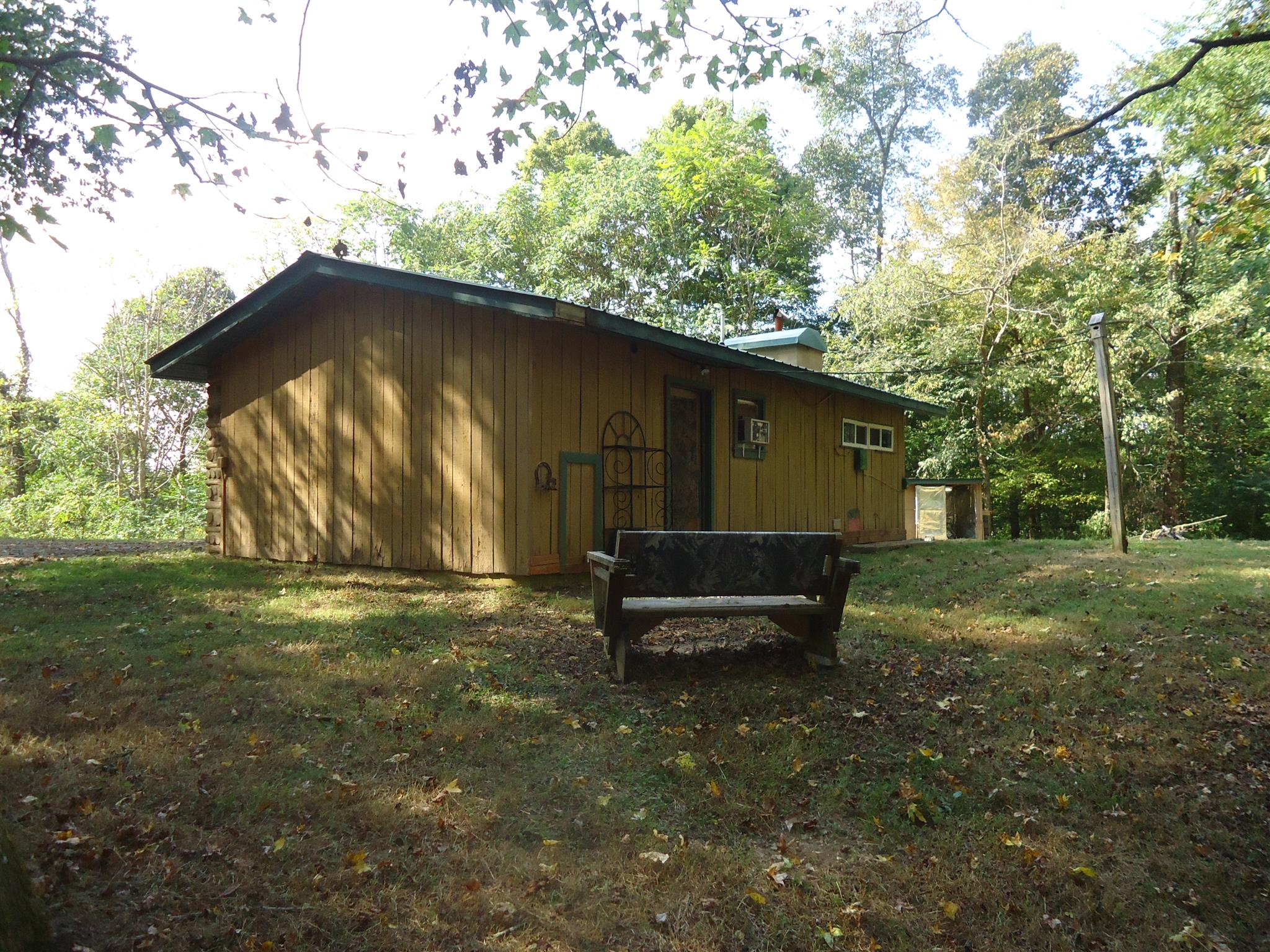 239 Loyd Road Pulaski, TN 38478 - Photo 11 of 19 a backyard of a house with table and chairs