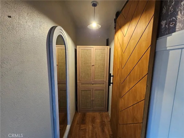 a view of a room with cabinets
