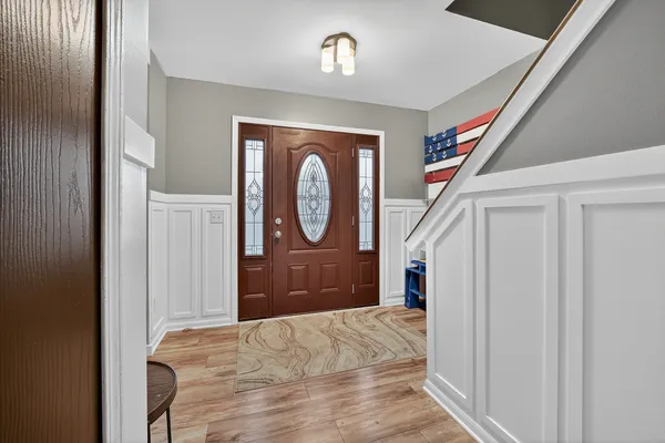 a bedroom with a bed and a closet