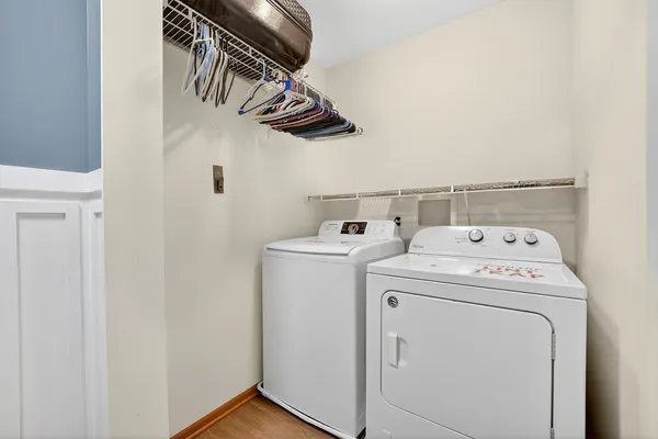 a utility room with dryer and washer