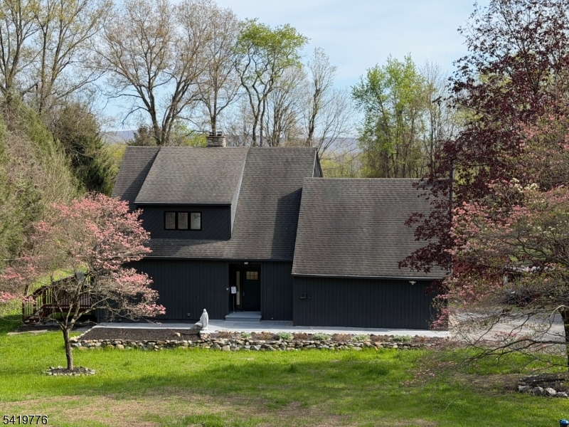 front view of house with a yard
