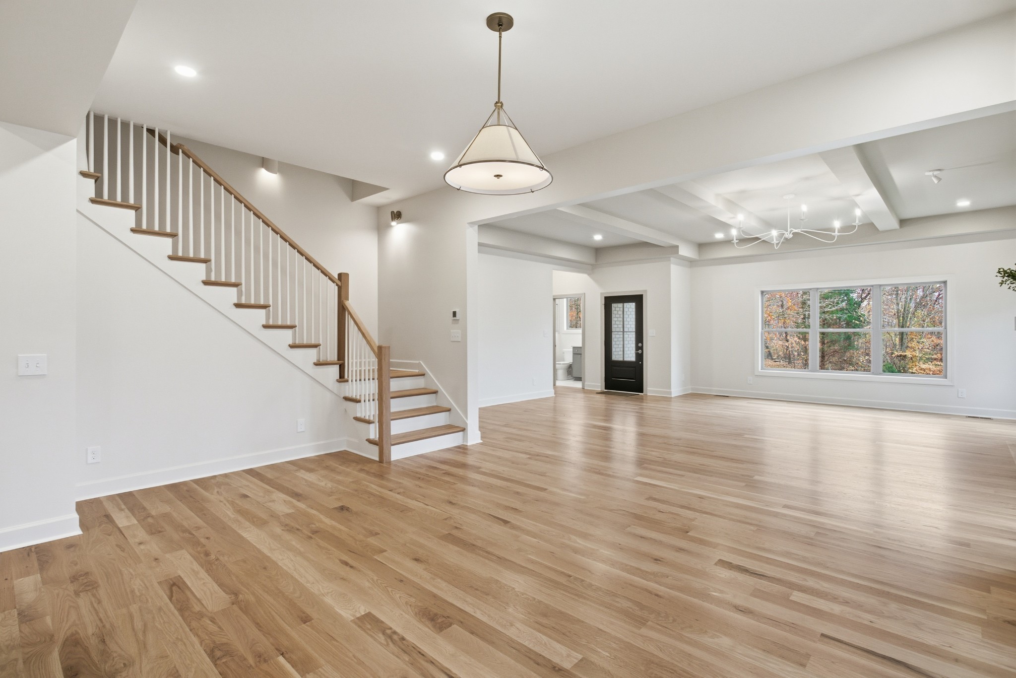 2957 Pace Road Clarksville, TN 37043 - Photo 14 of 67 a view of an room with wooden floors and stairs