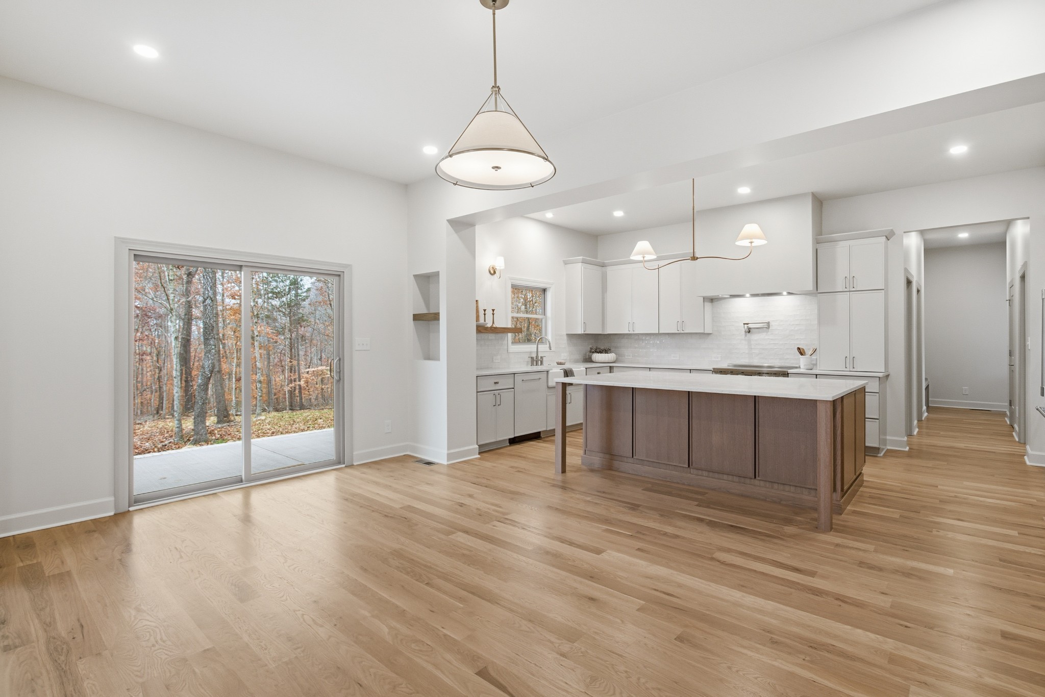 2957 Pace Road Clarksville, TN 37043 - Photo 18 of 67 a large kitchen with stainless steel appliances kitchen island a large counter top and a chandelier