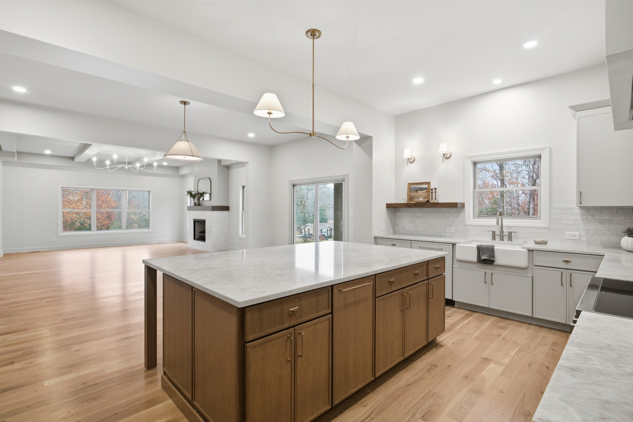 2957 Pace Road Clarksville, TN 37043 - Photo 26 of 67 a large kitchen with kitchen island a sink counter space appliances and a living room view